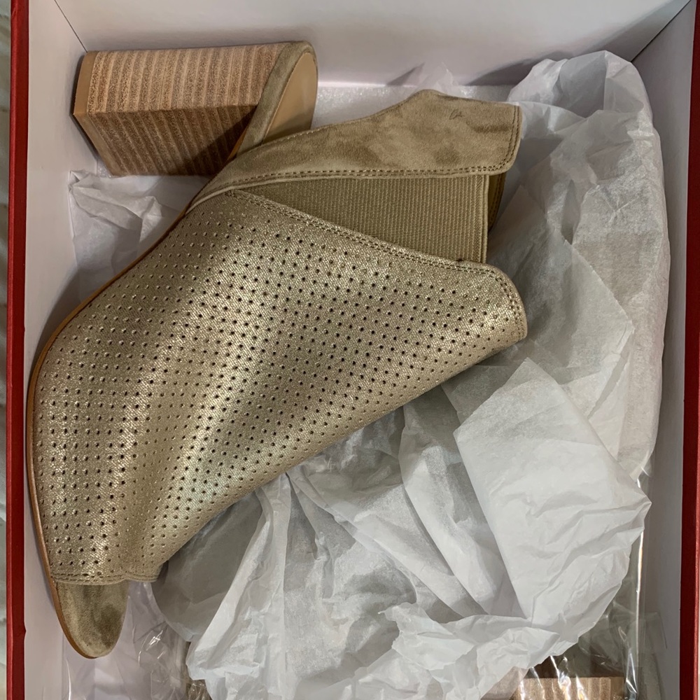 Heel booty type women’s shoes.